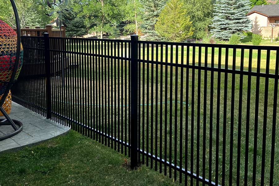 black-aluminum-fence-coming-off-deck-farmington-nm